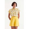 Short botones amarillo