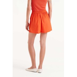 Short botones naranjas