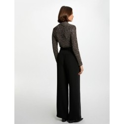 Sueter brillo dorado y negro trosali